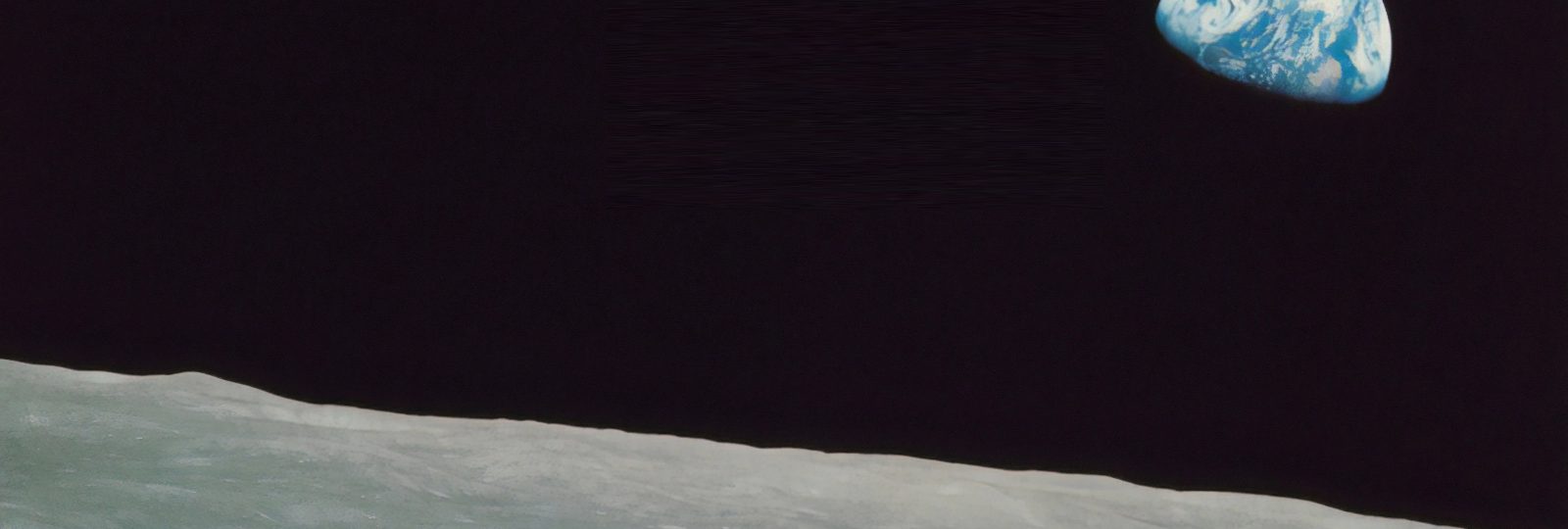 Earth rising over the Moon's horizon, the space theme behind Spacebar Digital Production